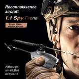 Grey single-rotor spy drone helicopter with extended antenna, no aileron