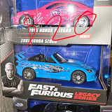 Blue diecast toy car in blister box packaging, black wheels, Fast & Furious Legacy Series