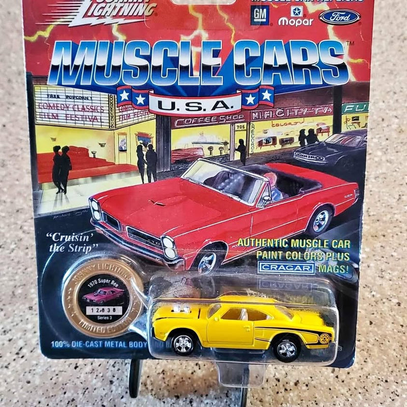 1:64 diecast muscle car in blister pack, red car with yellow car