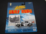 Johnny Lightning Surf Rods diecast car blister pack with white and black truck