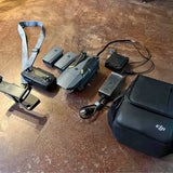 DJI Mavic Pro drone kit with controller, batteries, charger, and carrying case
