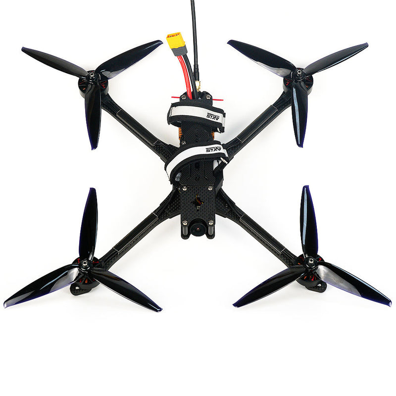 Black quadcopter drone with four propellers and central camera module
