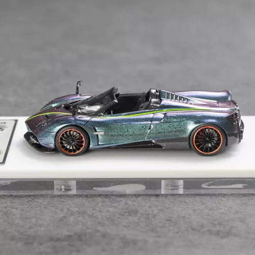 Purple and teal convertible sports diecast model car with detailed black wheels