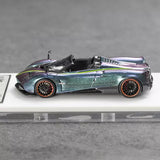 Purple and teal convertible sports diecast model car with detailed black wheels