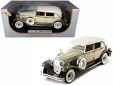 Tan and coffee brown 1930s diecast model car in front 3/4 view with open grille