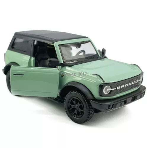 Ford Bronco 1:36 diecast model car, light green with open front door and black wheels
