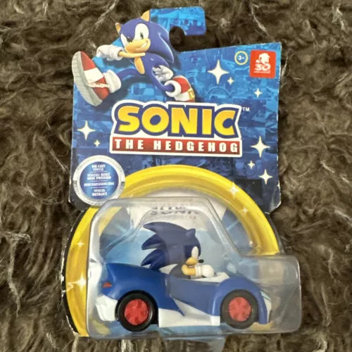 Blue Sonic diecast car in clear blister packaging with yellow ring