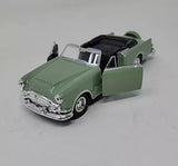 Green convertible diecast model car with open doors, chrome details, 1:34–1:39 scale