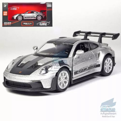 Silver diecast Porsche 911 GT3 RS model car with black racing stripes and rear wing