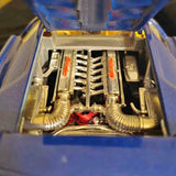 1/18 diecast car engine bay with chrome components and blue body