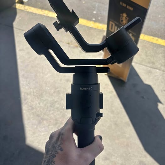 DJI Ronin-SC handheld gimbal stabilizer with extended handle and base mount