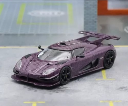 Purple KOENIGSEGG diecast car model, 1/64 scale, detailed open-cockpit design