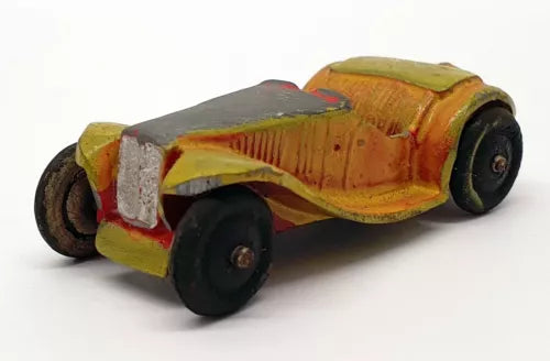 Vintage diecast sports car toy, orange-red body with gray details and black wheels
