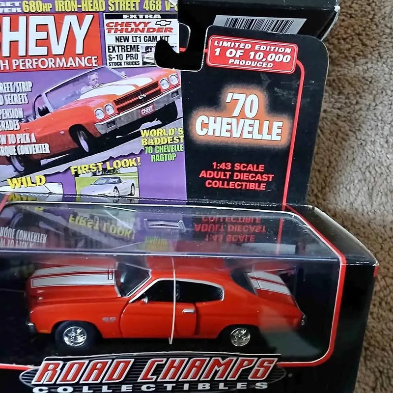 Red diecast 1:43 scale 1970 Chevelle car model in Road Champs packaging