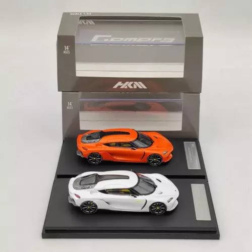 1:64 diecast supercar model set with orange and white cars in tray