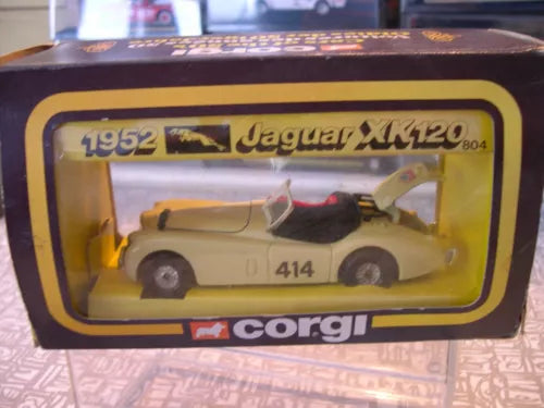 Diecast rally car toy in packaging, Jaguar XK120 design, Corgi logo