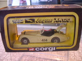 Diecast rally car toy in packaging, Jaguar XK120 design, Corgi logo