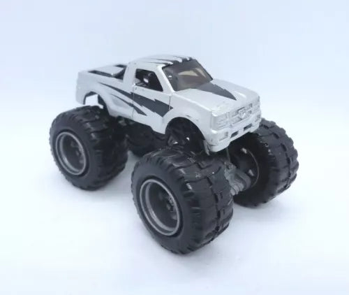 1:64 silver monster truck diecast with oversized black tires and black hood stripes