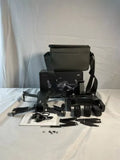 Black drone with remote controller and accessories kit