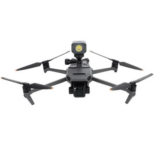 Drone night flying light with mounting bracket, front view, dark gray housing