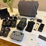 DJI Mavic 3 Fly More Combo drone kit with gray controller, drone, batteries and charging cables