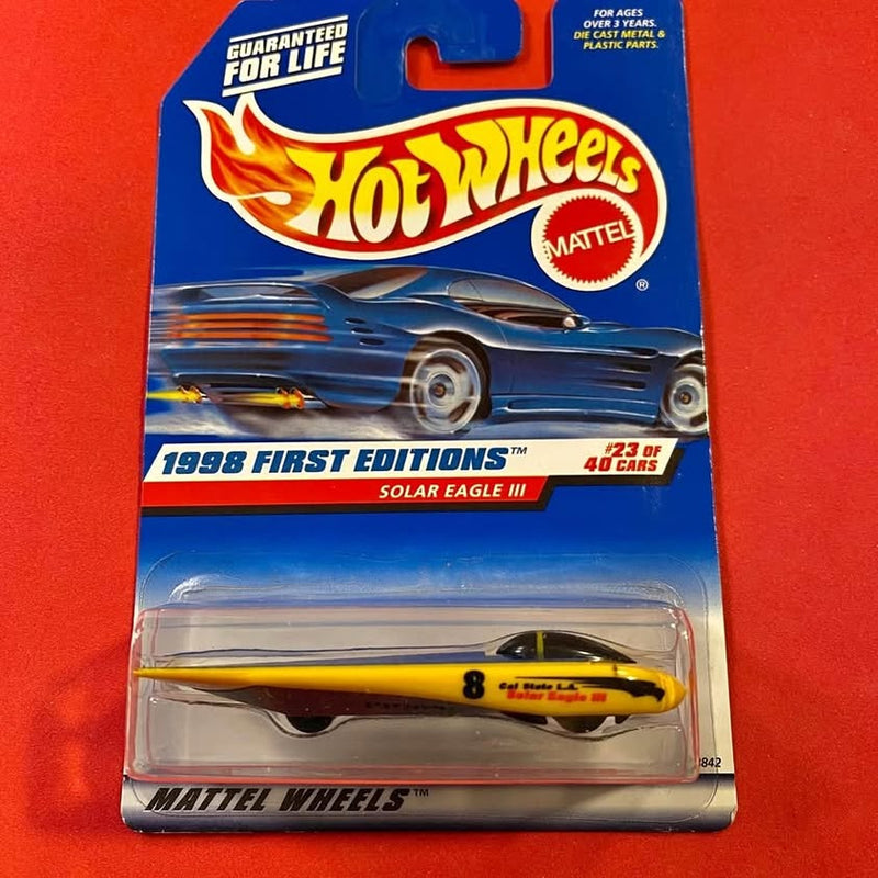 Hot Wheels Solar Eagle III diecast car in blister pack, yellow and blue