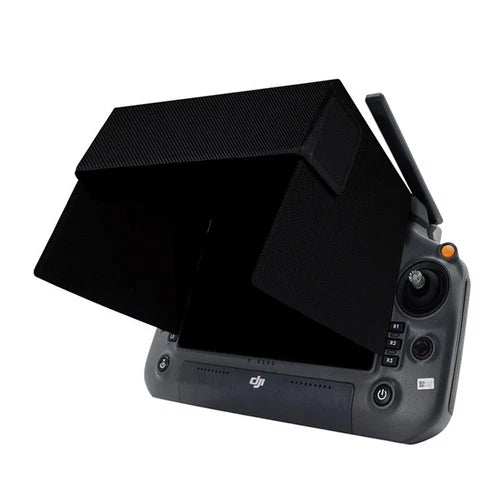 Black drone lens hood sunshade cover, fitted over the front camera module