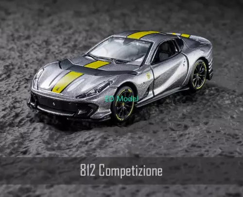 1:64 gray sports diecast car with yellow racing stripes