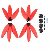 Red 3-blade drone propeller sets with quick-release mounts, two pairs