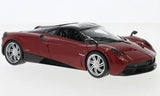 Dark red diecast sports car model, front 3/4 view, 1:24 scale.