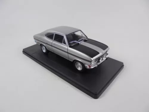 Diecast rally model car, gray body with black hood stripe, 1:24 on display base