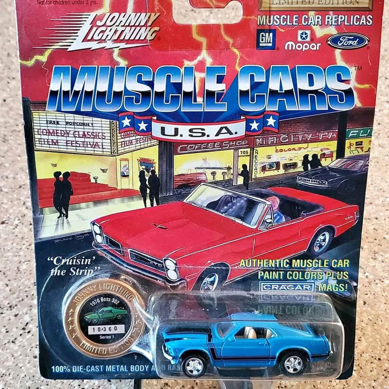 Diecast muscle car toy in blister packaging, red and blue.