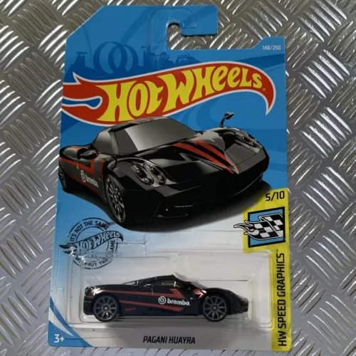 Black diecast sports car in blister card packaging