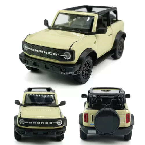 Beige Ford Bronco diecast model car, open-top metal toy, front 3/4 view
