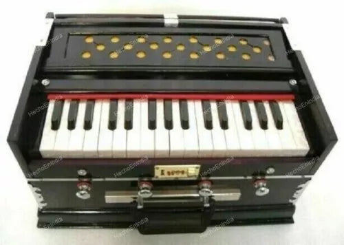 2.5-octave harmonium with 32-key keyboard and stop knobs, dark case