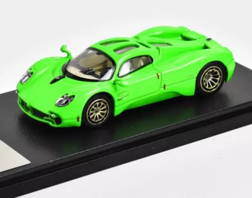 Green racing sports diecast model car with black wheels, front three-quarter view