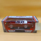 Road Signature red 1953 Packard Caribbean 1:18 diecast model car in display case