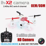 Mini quadcopter drone with camera, red prop guards, and black remote.