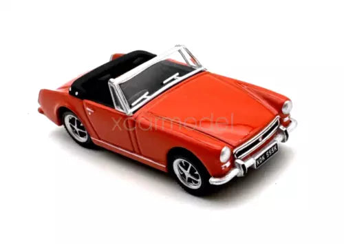 Red convertible sports diecast model car, black top, chrome grille