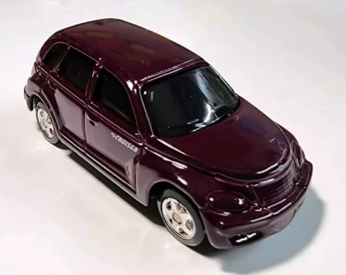 Maroon 2000 PT Cruiser 1/64 diecast model car with plastic parts, side view