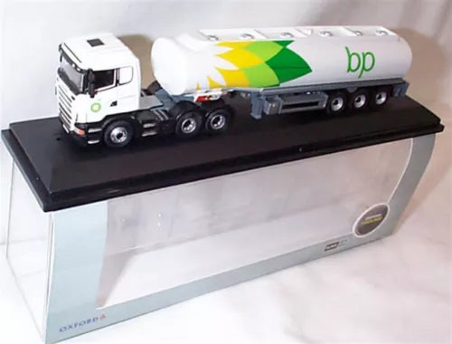 White Scania tanker truck model with BP livery on black display base