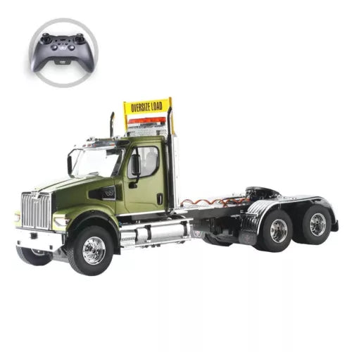 Green diecast RC heavy-haul tractor truck with tandem rear axle and chrome details