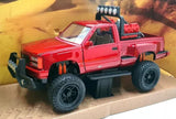 Dark red diecast pickup with lifted stance and chunky off-road tires