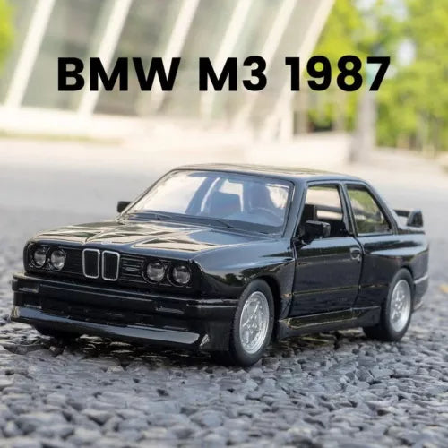 Black 1:36 diecast BMW M3 1987 toy car, front three-quarter view