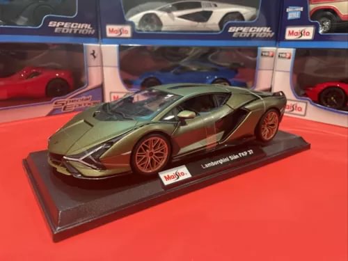 Green and gold Lamborghini Sian FKP 37 diecast model on display base, 1/18 scale