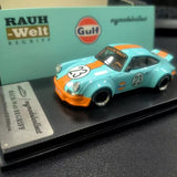 Turquoise and orange diecast model car with Gulf logo, front three-quarter view.