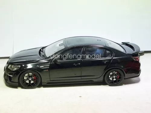 Black diecast sports car, 1/18 scale, front three-quarter view