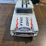 1:18 scale diecast car front view with grille and headlights, 'SMITH RADIATOR' decals