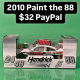 Diecast race car in box, white and green, Hendrick Motorsports #88 graphics