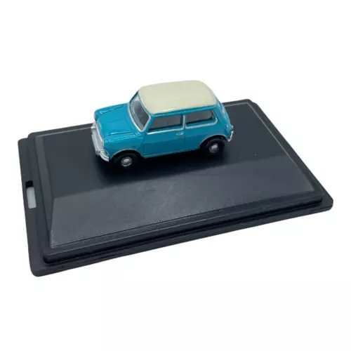 Blue mini car diecast model with white roof, 1:76 scale on black display base